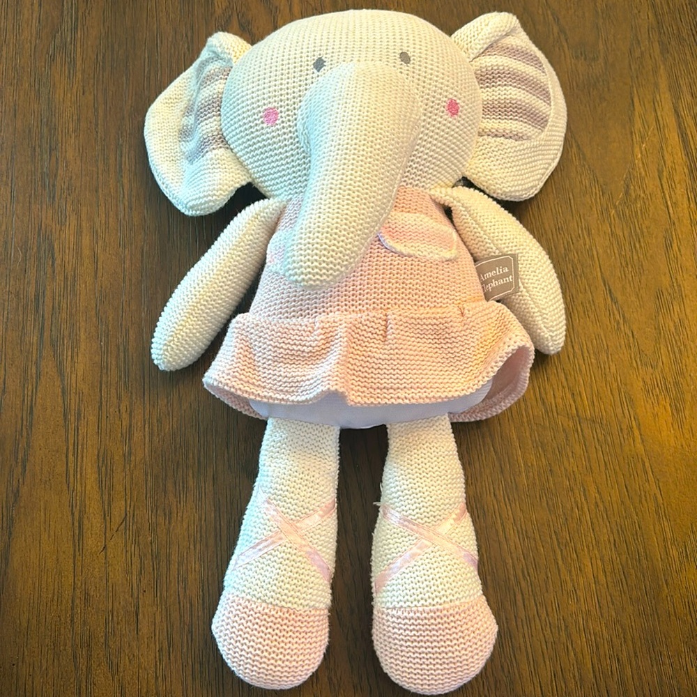 Amelia Elephant living textiles plush toy. Knitted stuffed animal with rattle.